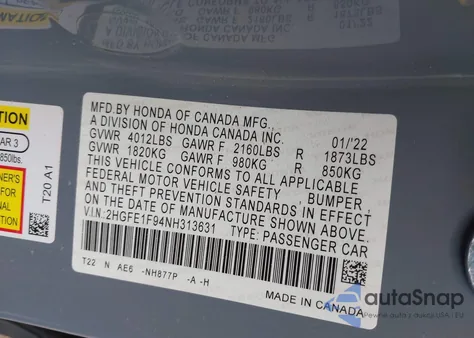 2022 Honda Civic Touring z USA, uszkodzony, nr VIN 2HGFE1F94NH313631